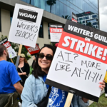 Some Hollywood writers have brought levity to their signs on the WGA's picket lines. But the stakes of this fight — the industry's future — are no laughing matter.FREDERIC J. BROWN/AFP via Getty Images
